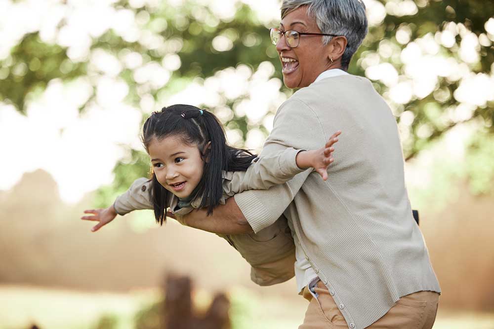 child or grandmother outdoors